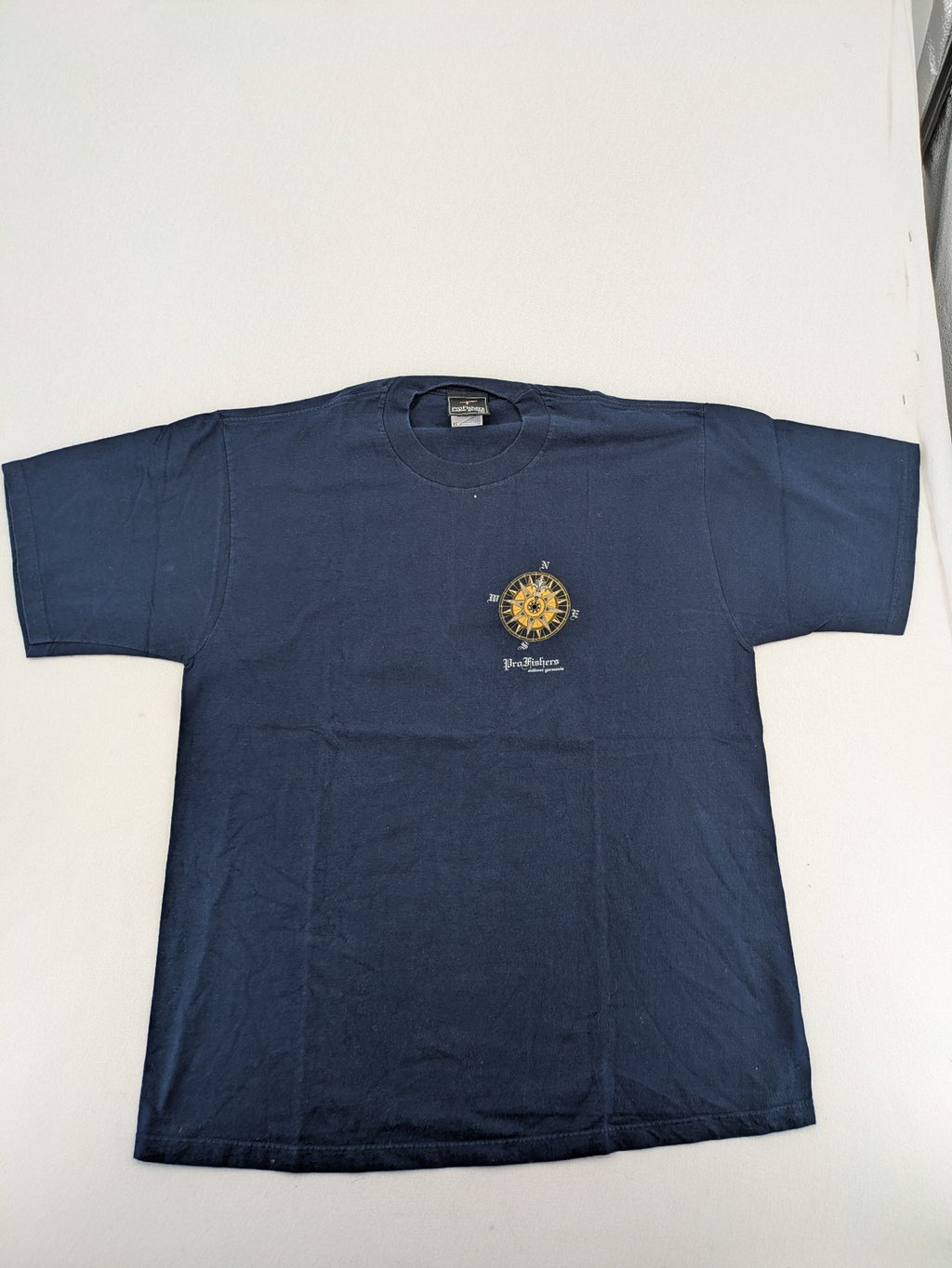 ProFishers navy t-shirt with compass print and large fish graphic on back.