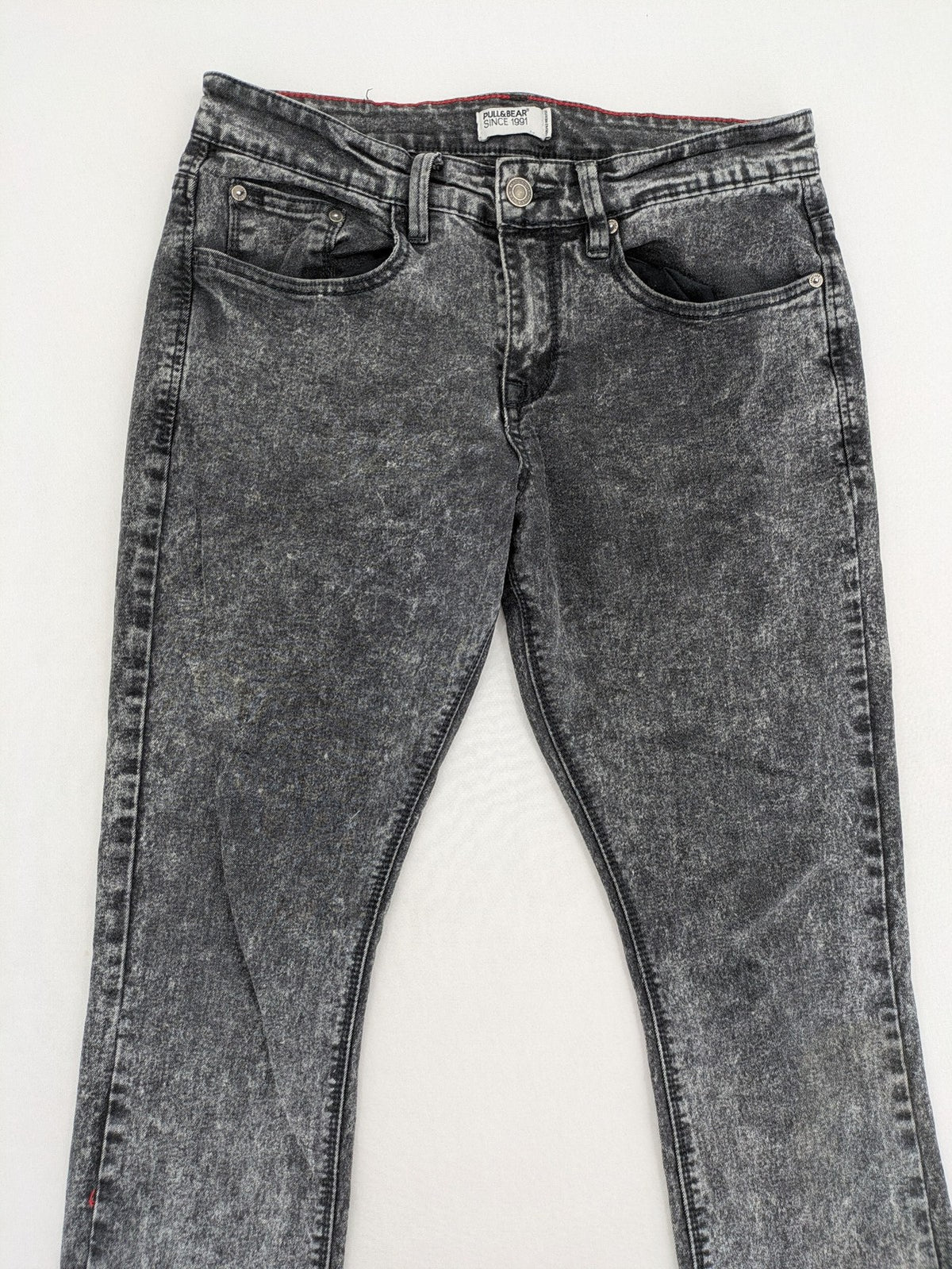 Pull&Bear black acid wash straight jeans slim fit with faded denim texture.