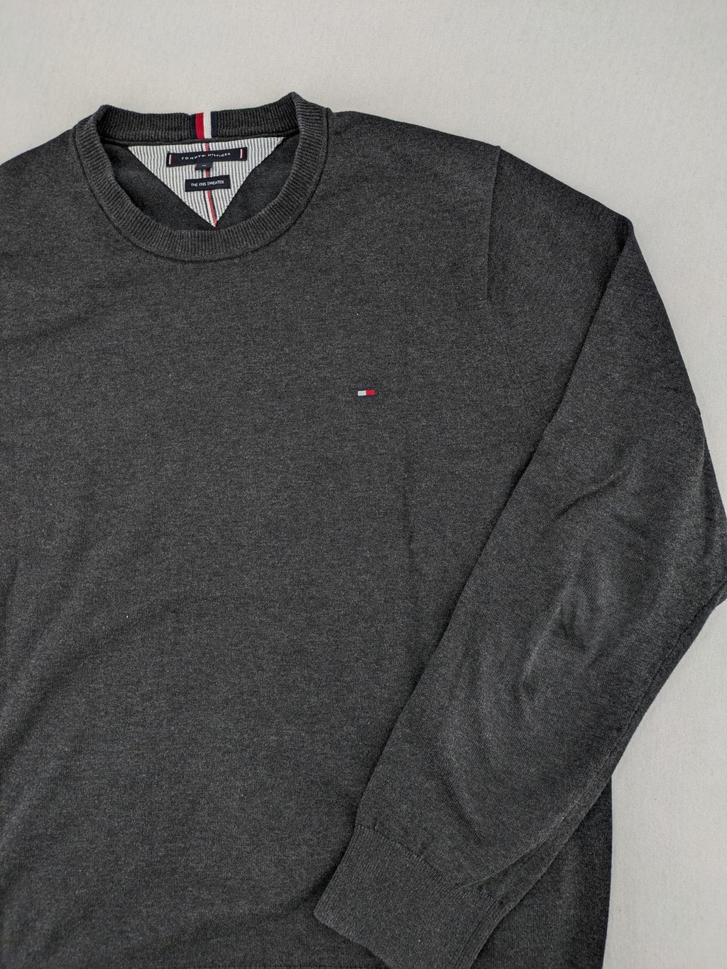 Tommy Hilfiger grey turtle neck jumper with embroidered flag logo on chest.