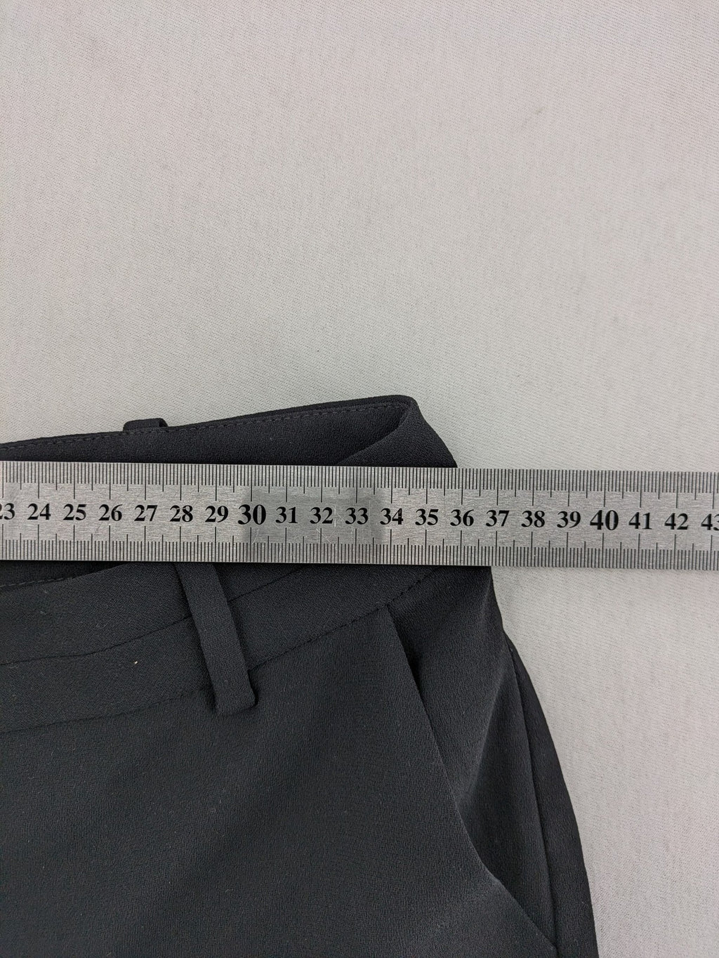 Mango Suit black trousers with zipper, belt loops, and front slant pockets.