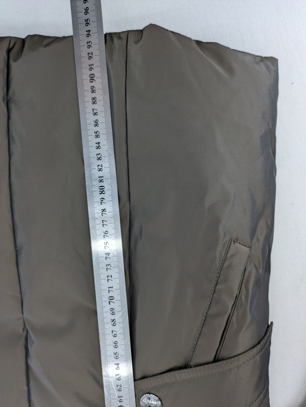 Gerry Weber Edition grey quilted coat with faux fur collar and metal toggle closures.