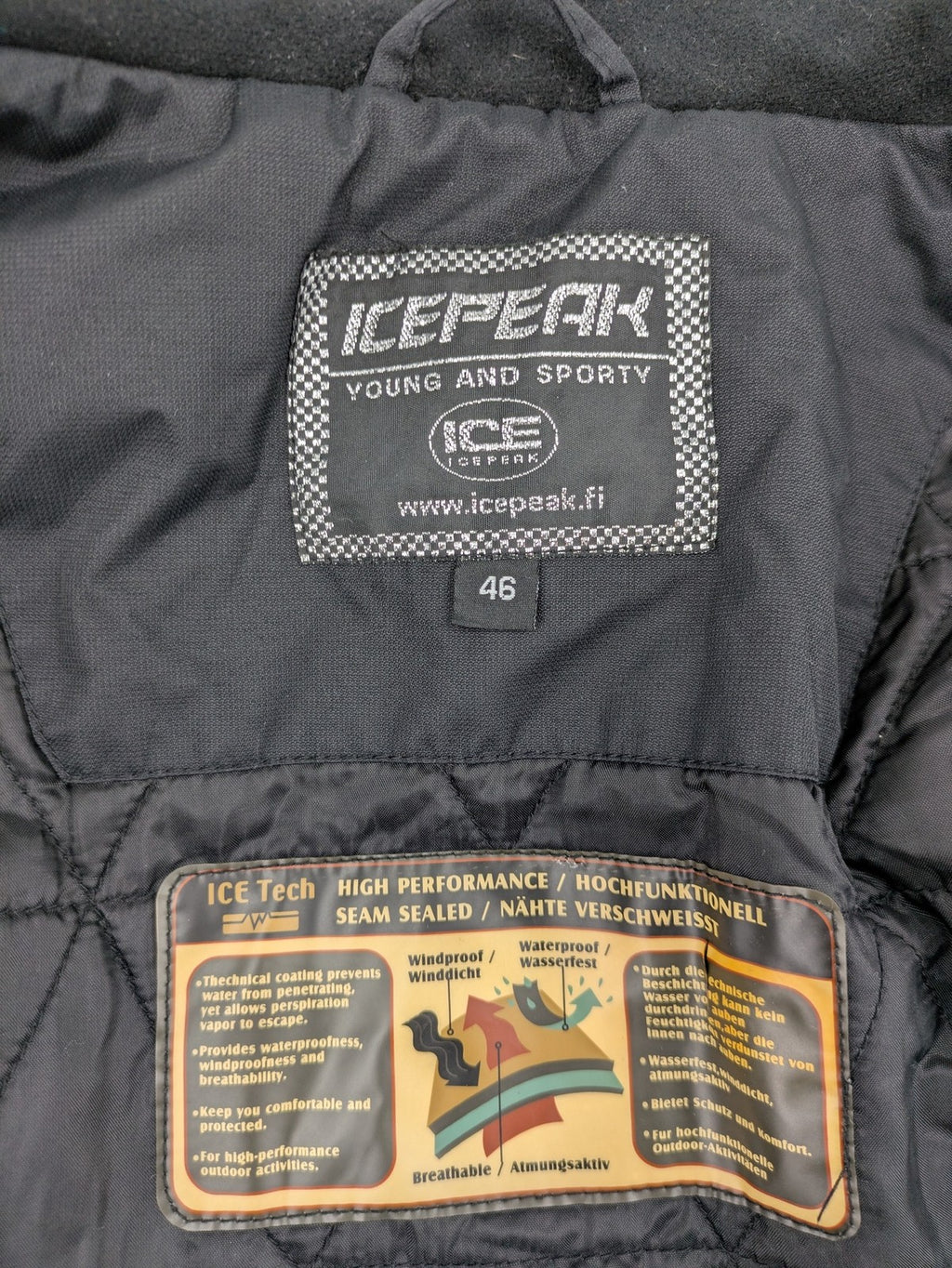 Icepeak black and white ski snowboard jacket with RECCO logo and quilted insulation.