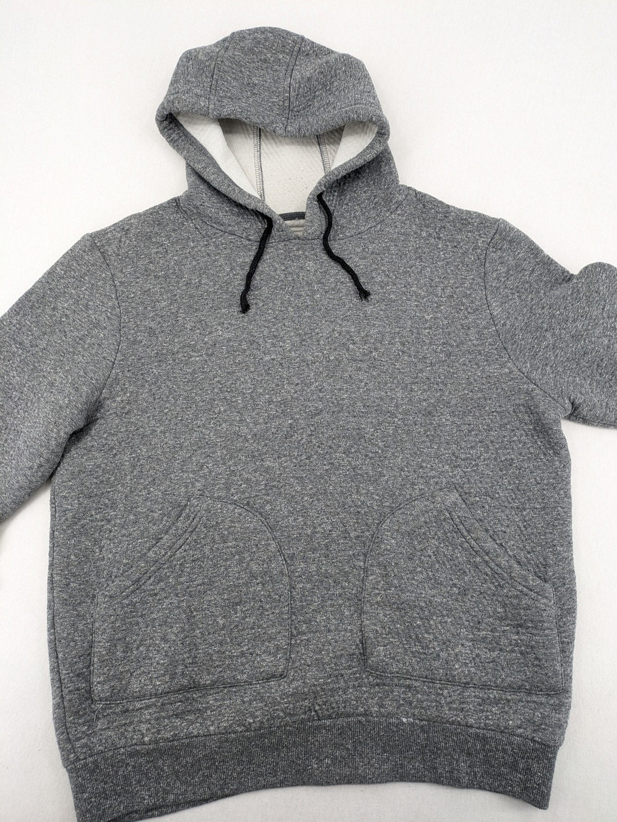 Cedarwood State grey pullover hoodie with adjustable drawstring hood and kangaroo pocket.
