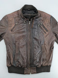 H&M green leather bomber jacket with ribbed collar and moto-style padding.