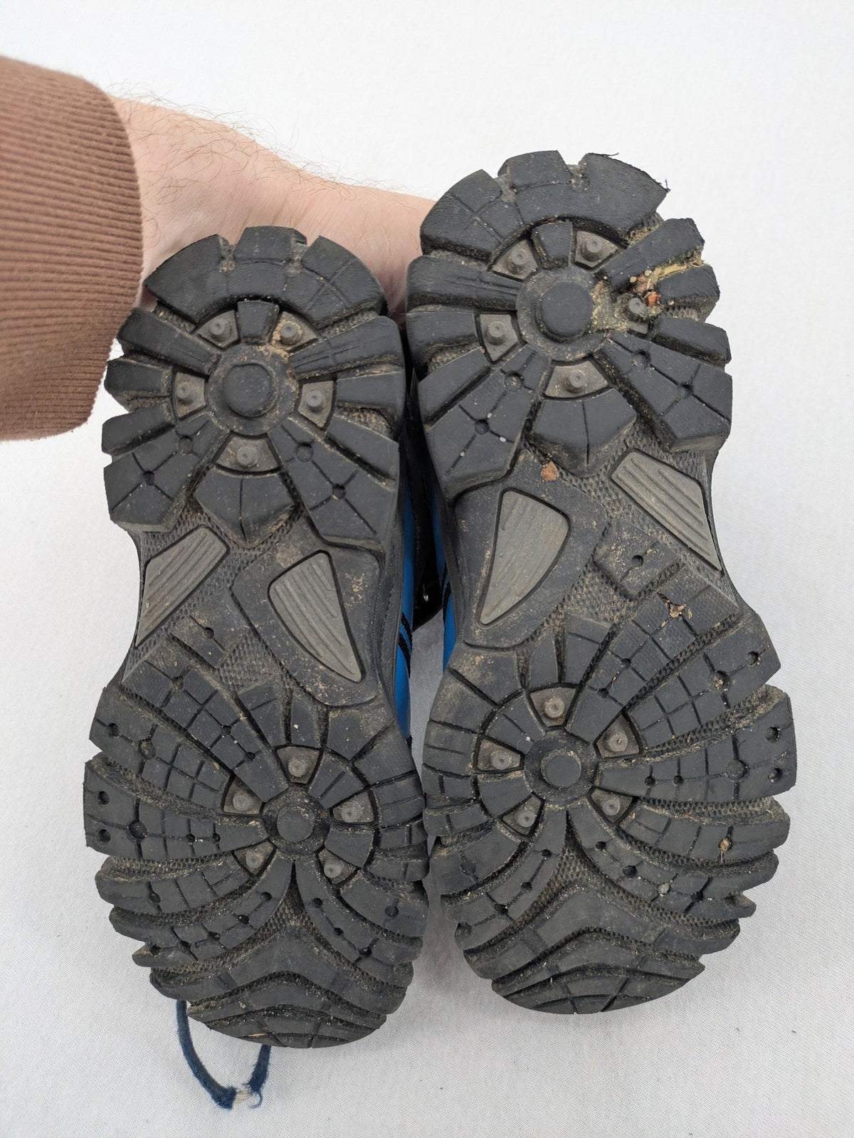 Outdoor grey and blue winter boots with high shaft, Velcro closure, and textured sole.