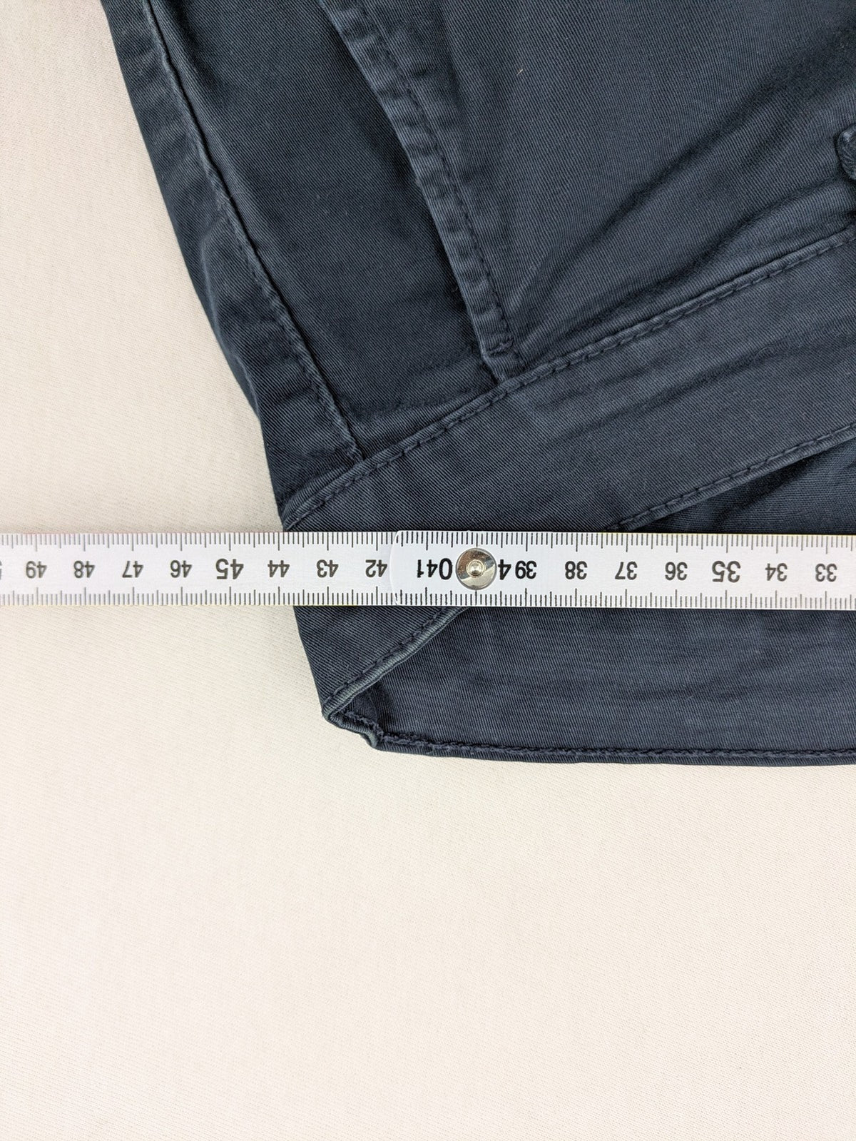 smog blue chino pants with belt loops, button fly, and side pockets