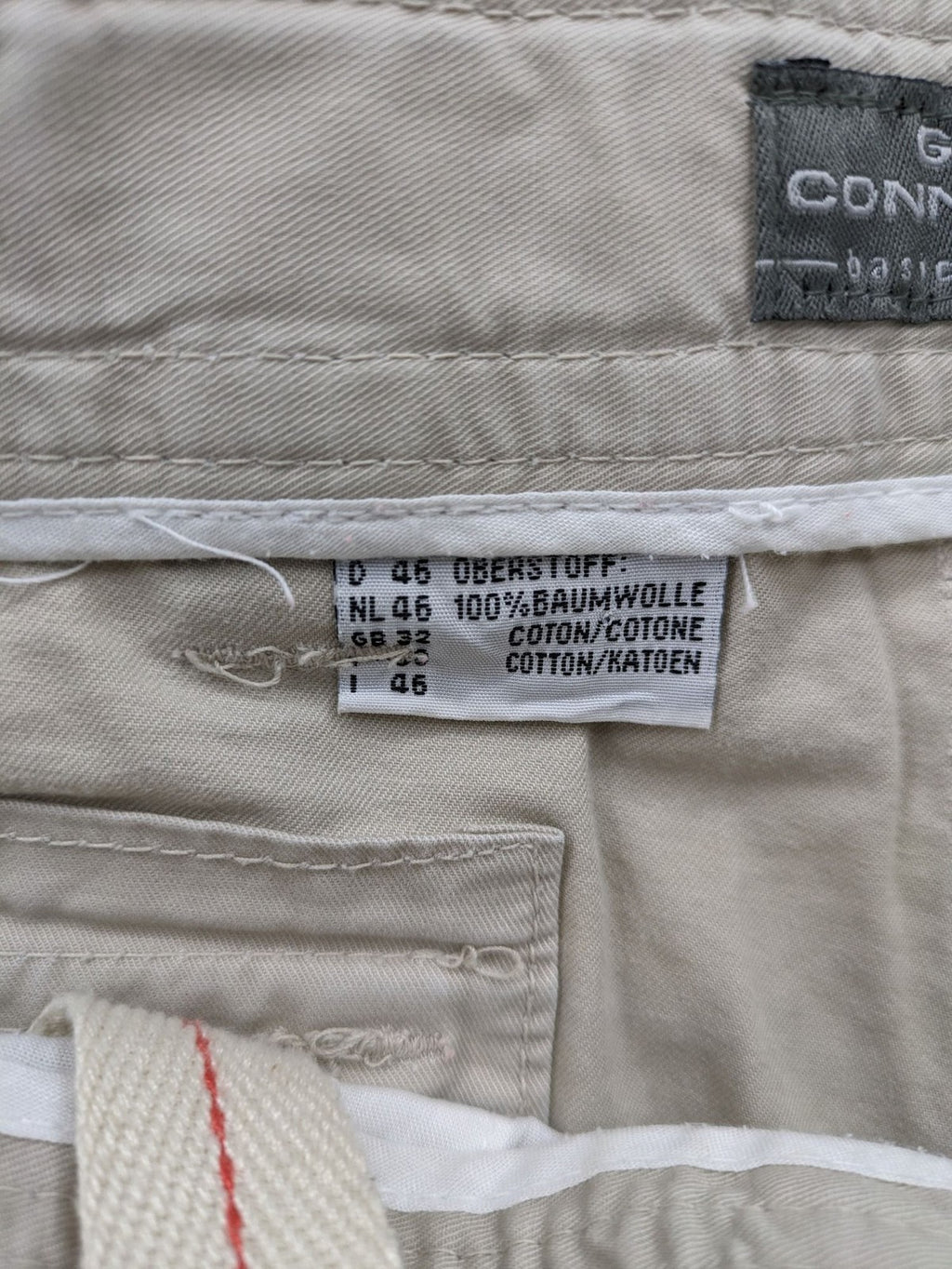 Grey Connection beige cargo shorts with multiple pockets and button closure, made from cotton.