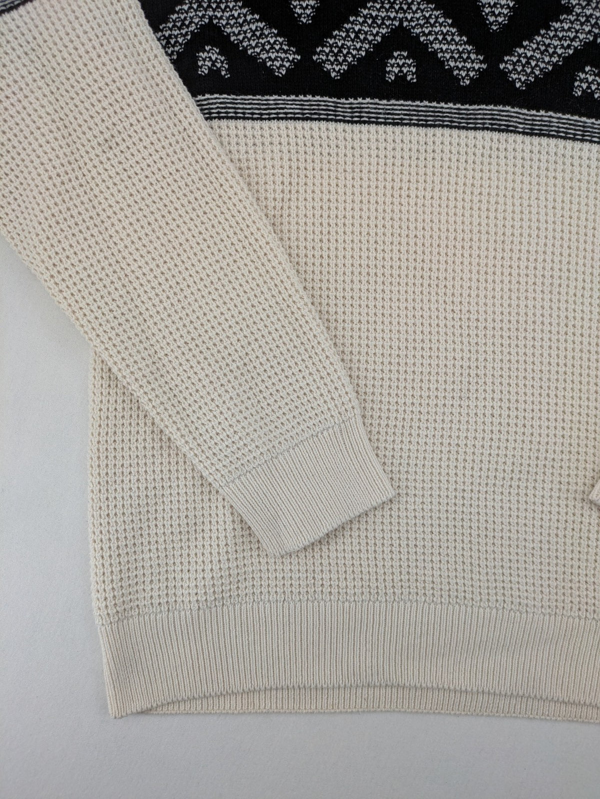 C&A turtle neck jumper black cream with Nordic pattern and waffle knit texture.