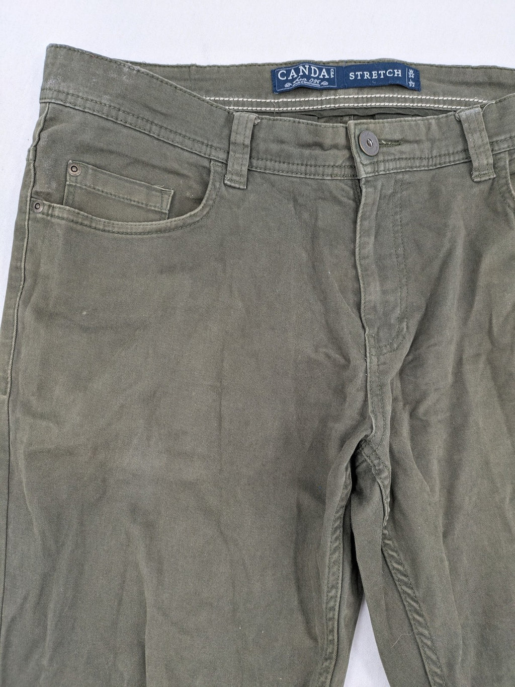 Canda khaki straight jeans 5-pocket design with stretch cotton material.