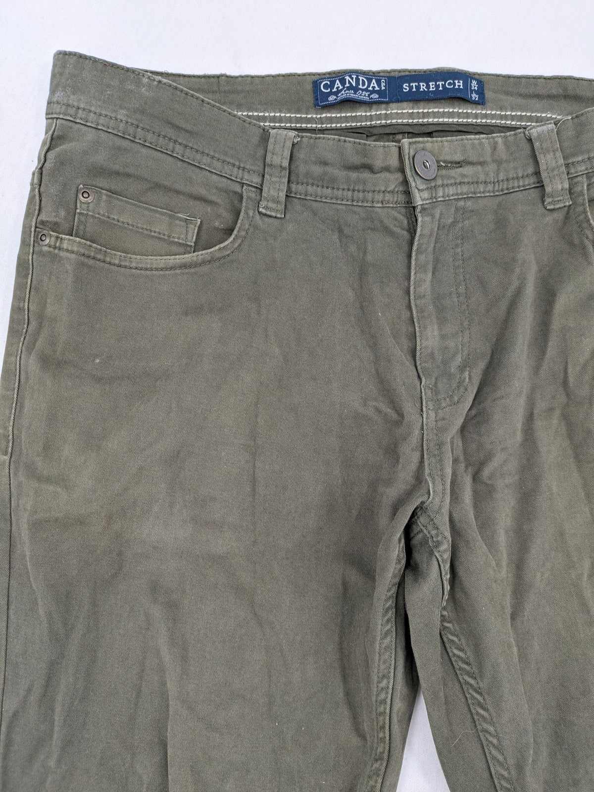 Canda khaki straight jeans 5-pocket design with stretch cotton material.