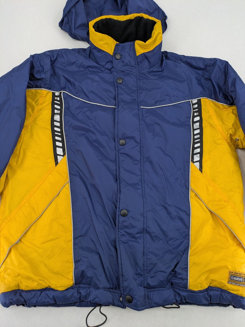 Shamp navy and yellow vintage ski jacket and pants set with retro design.