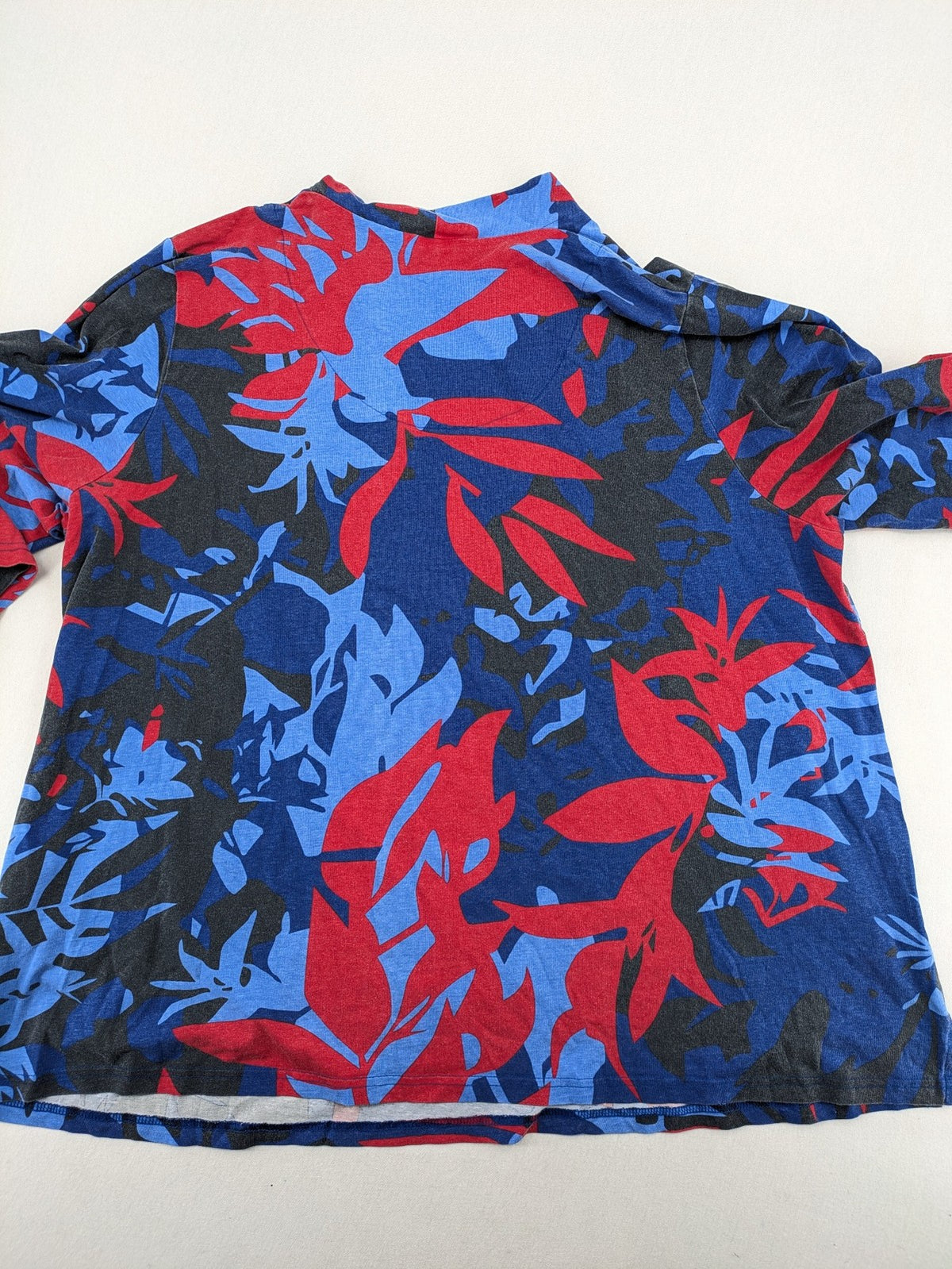 Ulla Popken blue top with floral print, V-neck, 3/4 sleeves, soft cotton blend.