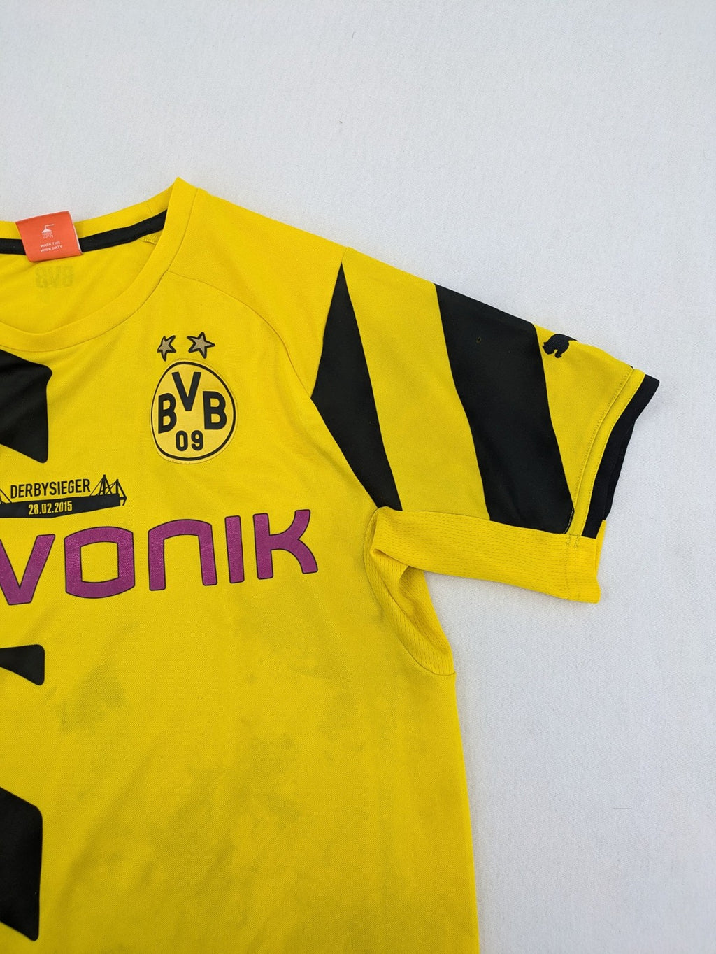 Puma black and purple soccer uniform with yellow accents, Reus #11, "Derbysieger 2015" print.