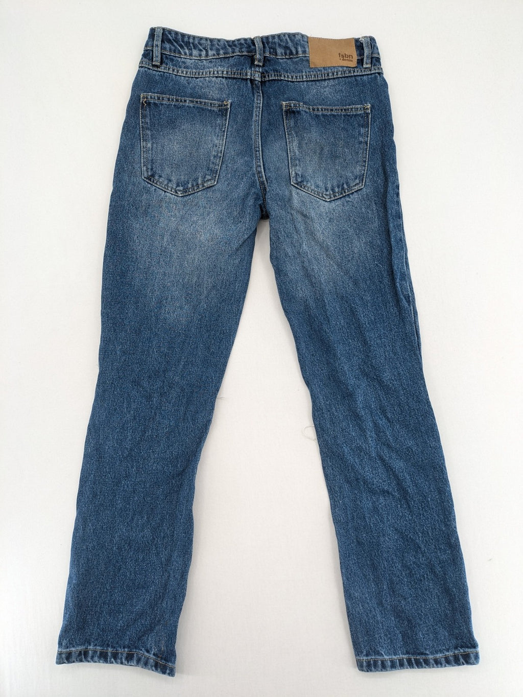 FSBN blue straight jeans with distressed knee rips and classic button fly.