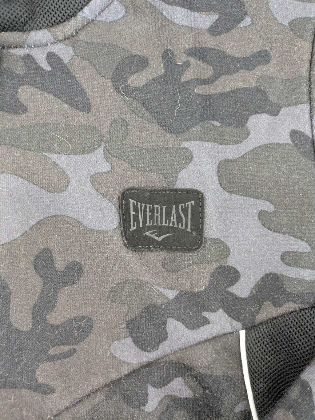 Everlast black grey camouflage jacket with full zip and attached hood.