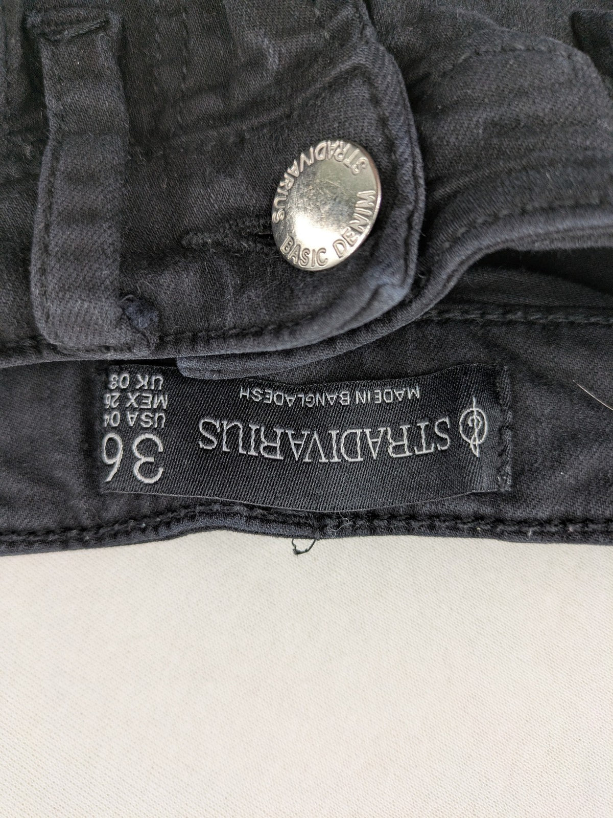 Stradivarius black skinny jeans high waist raw hem five-pocket style