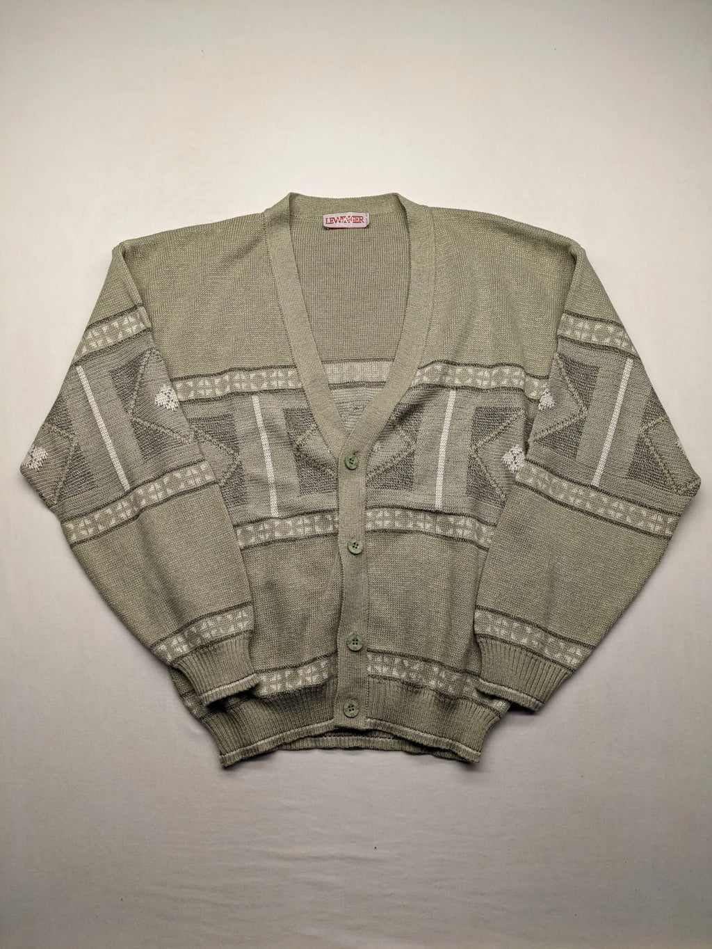 Lewträger cream and grey turtle neck jumper with geometric pattern and button placket.