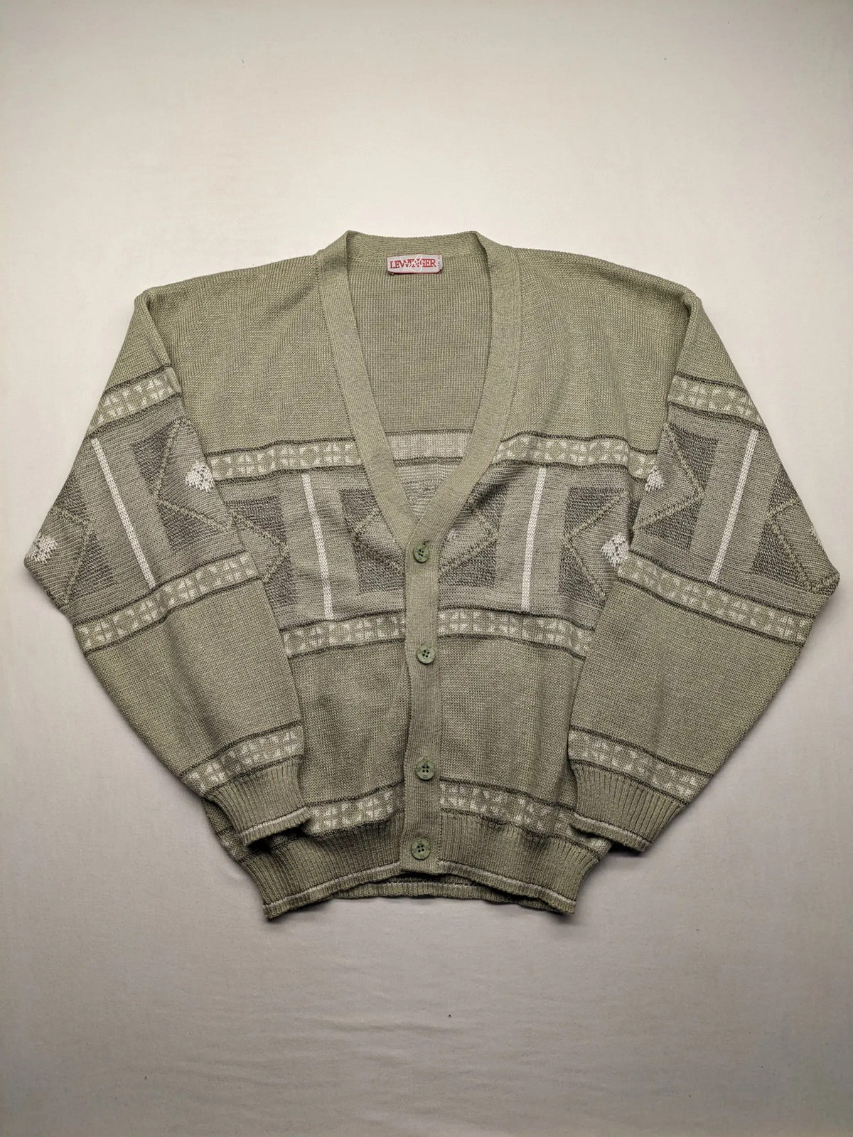 Lewträger cream and grey turtle neck jumper with geometric pattern and button placket.