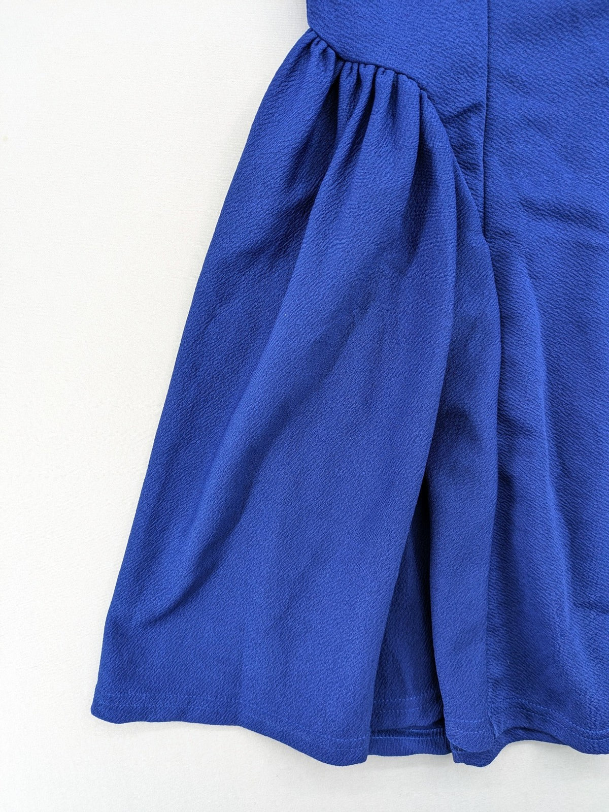SHEIN blue skater dress A-line fit and flare, square neckline, sleeveless, textured fabric.
