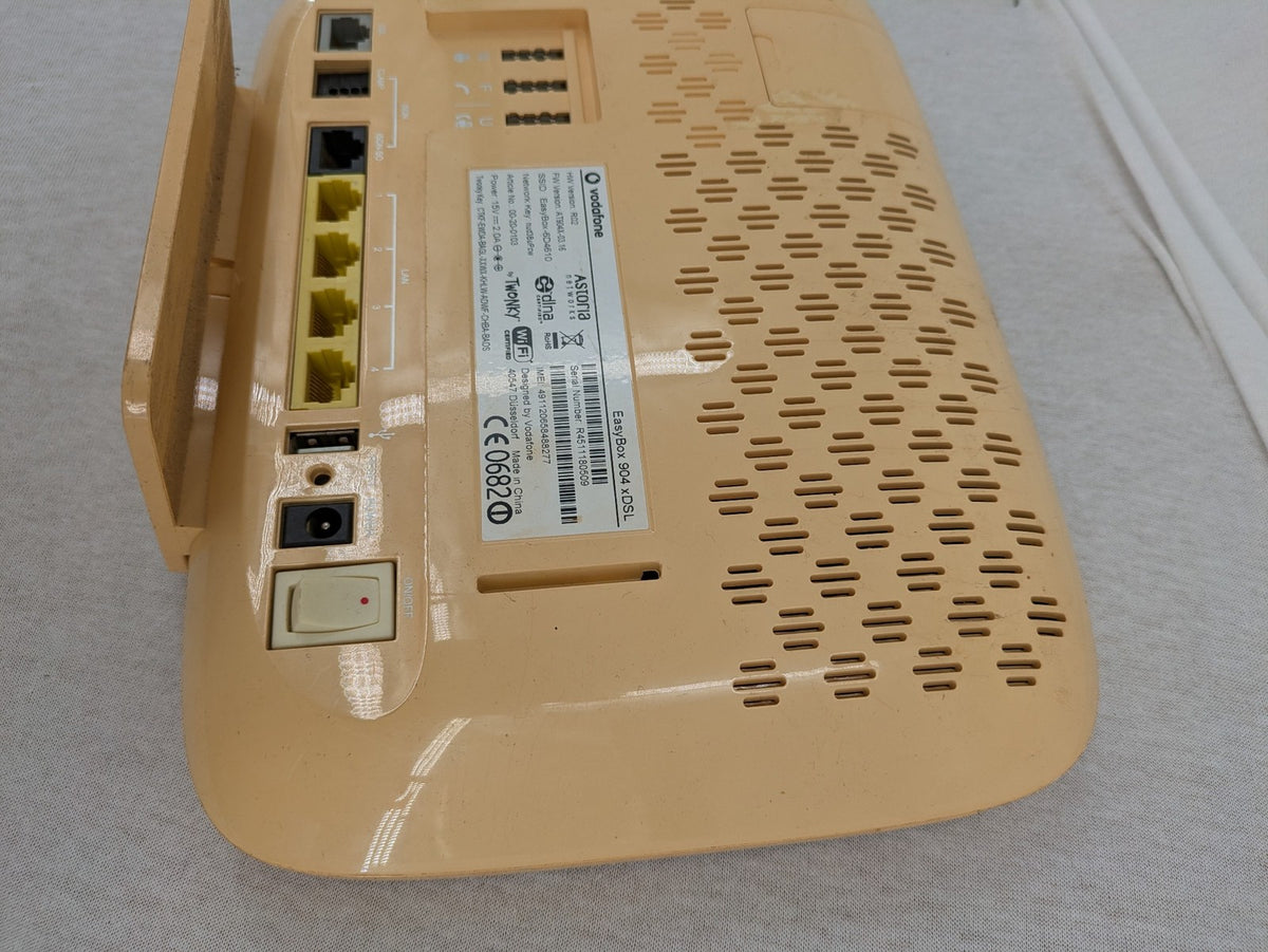 Vodafone beige wireless router EasyBox 904 with multiple ports and Astoria logo.