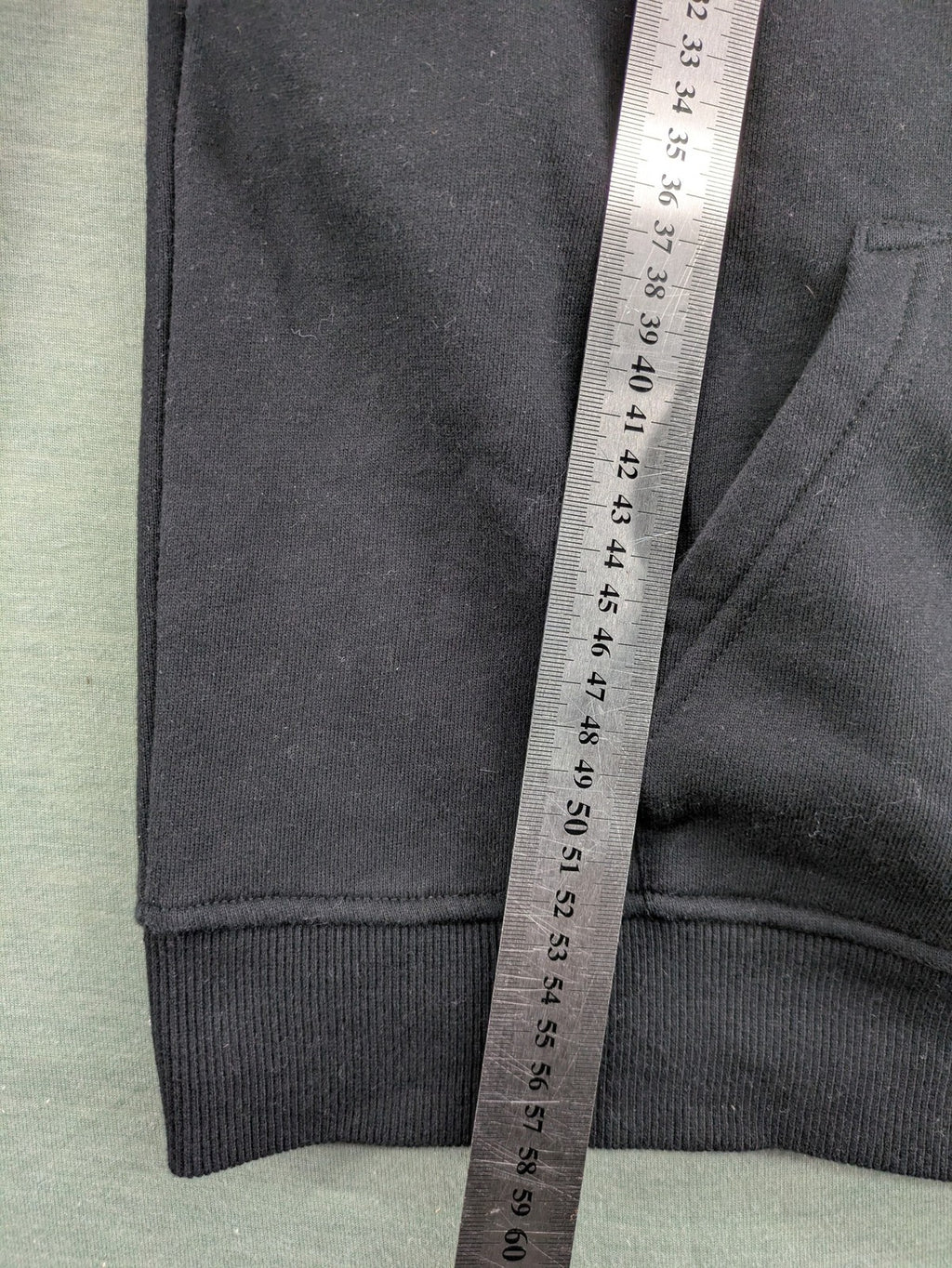 Ellesse grey hoodie with large logo, kangaroo pocket, and drawstring hood.
