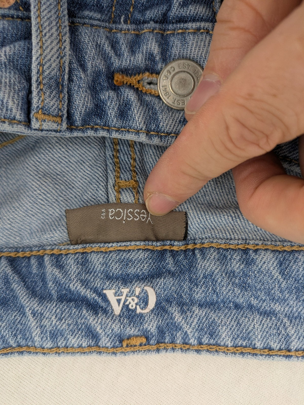 C&A blue mom jeans high waist with unique patchwork design and soft stretch denim.