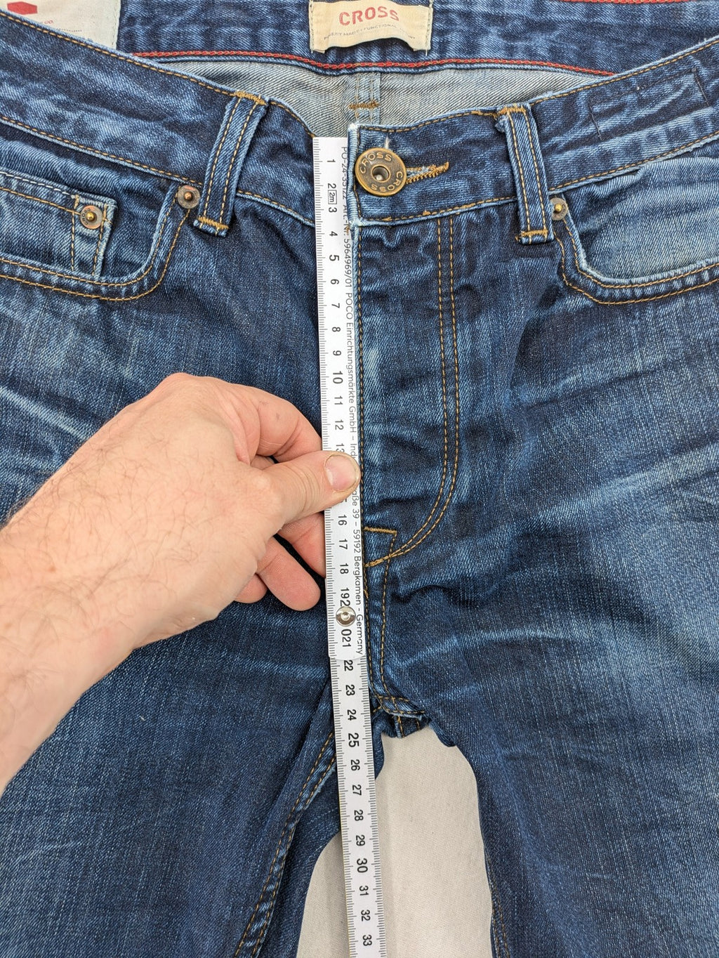 W32 blue straight jeans with classic 5-pocket design and dark wash denim.