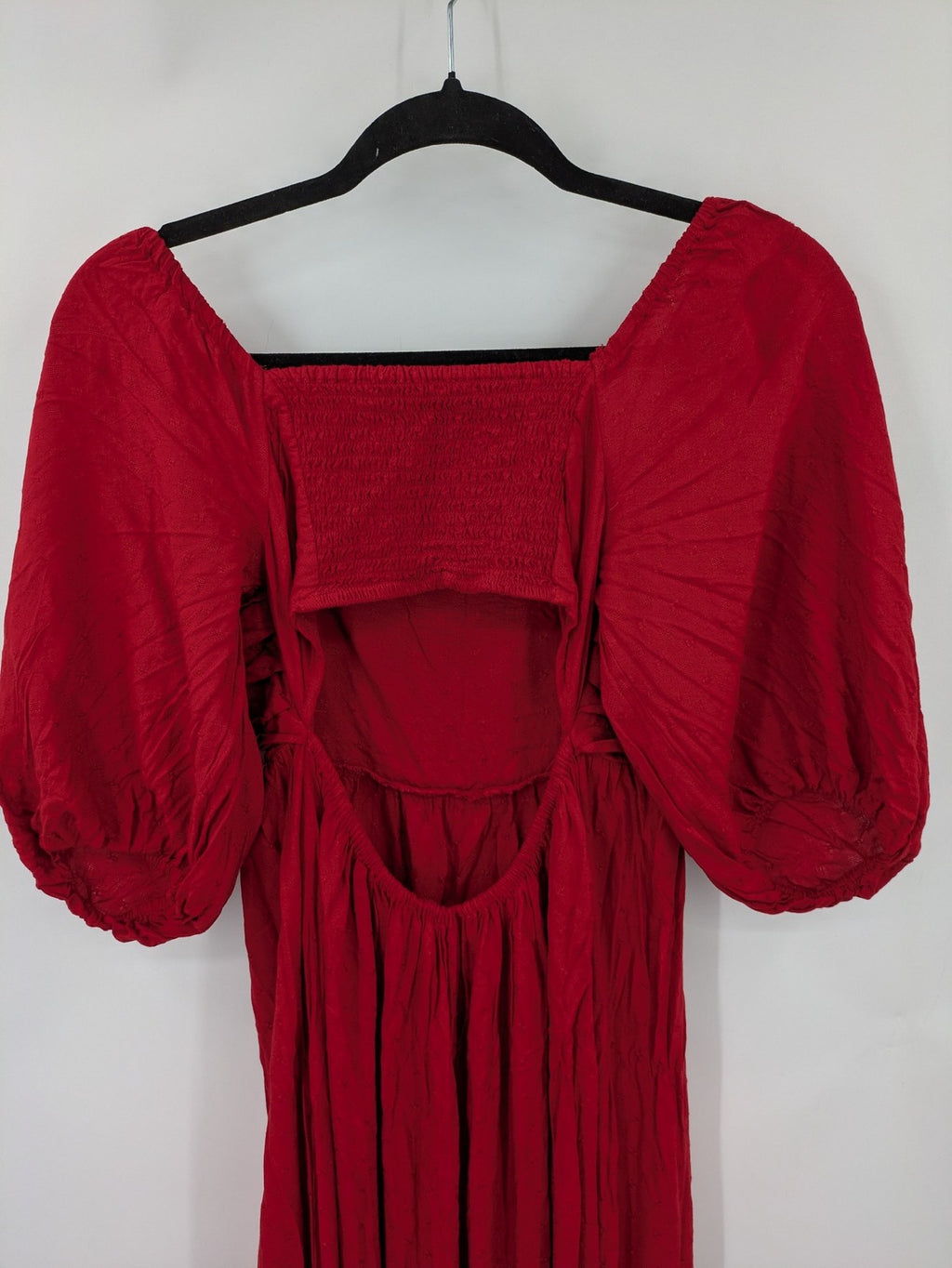 NEXT red midi dress with puff sleeves, smocked bodice, and stylish back cut-out.