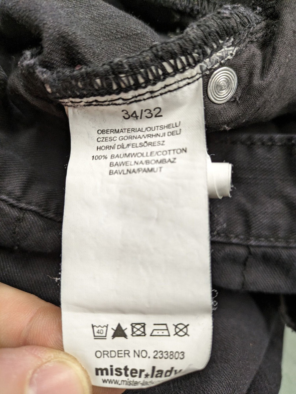 Savvy black pants straight fit with button fly, embroidered details and unique stitching.
