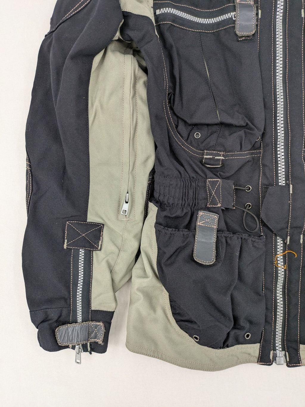 Polo multi biker jacket nylon with adjustable fit and multiple pockets.