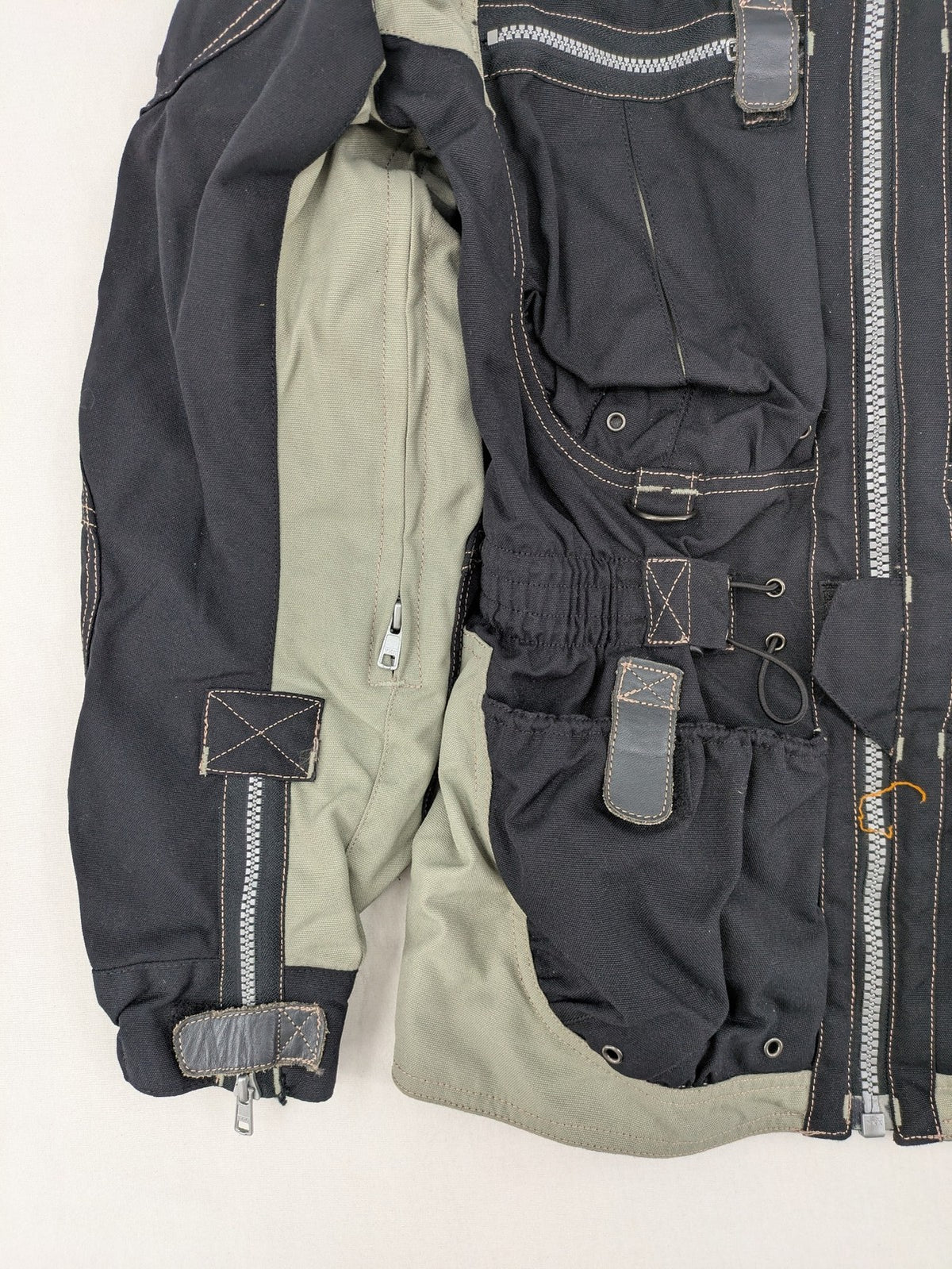 Polo multi biker jacket nylon with adjustable fit and multiple pockets.