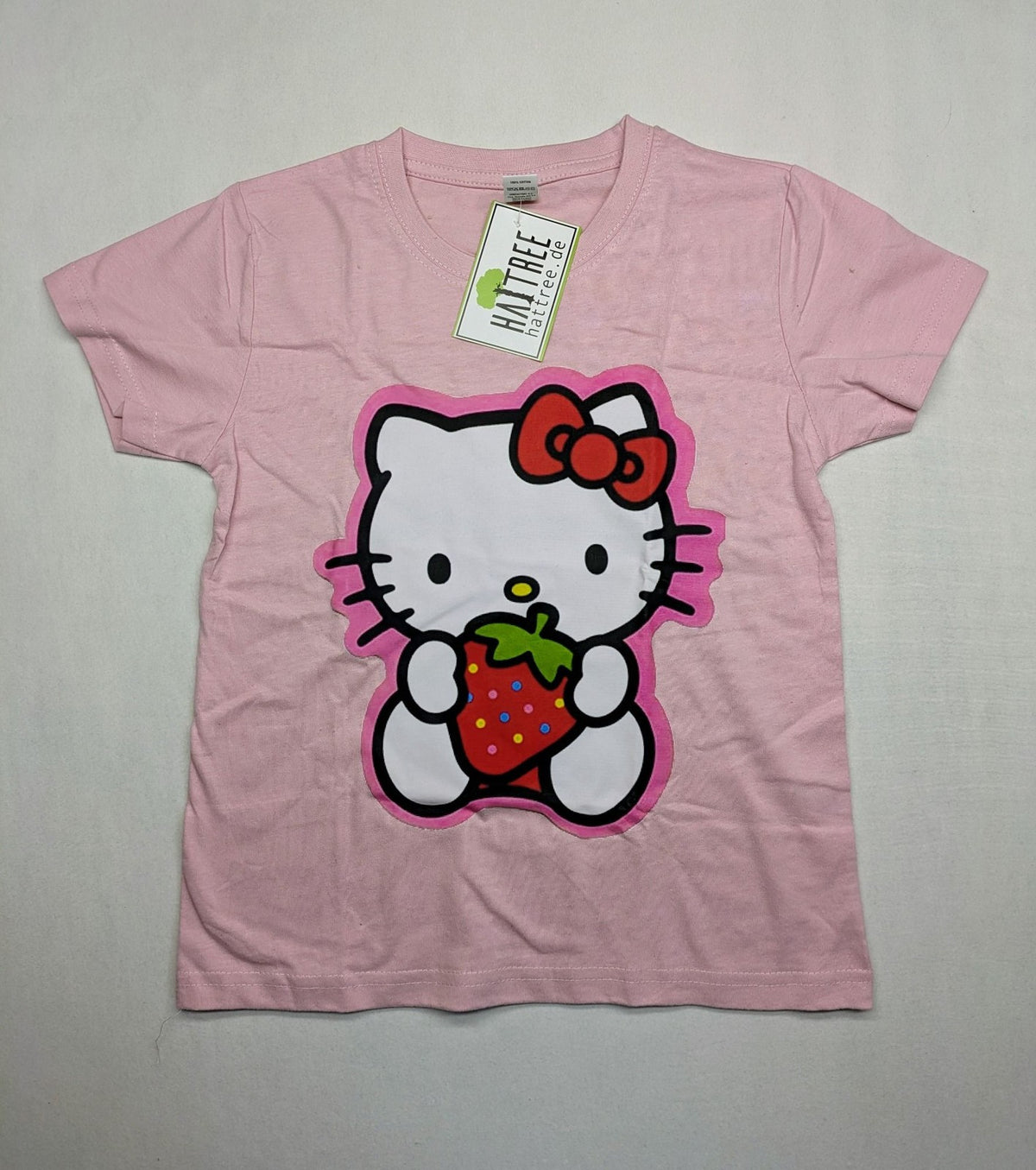 Hello Kitty multi T-shirt pink with large strawberry graphic and short sleeves.
