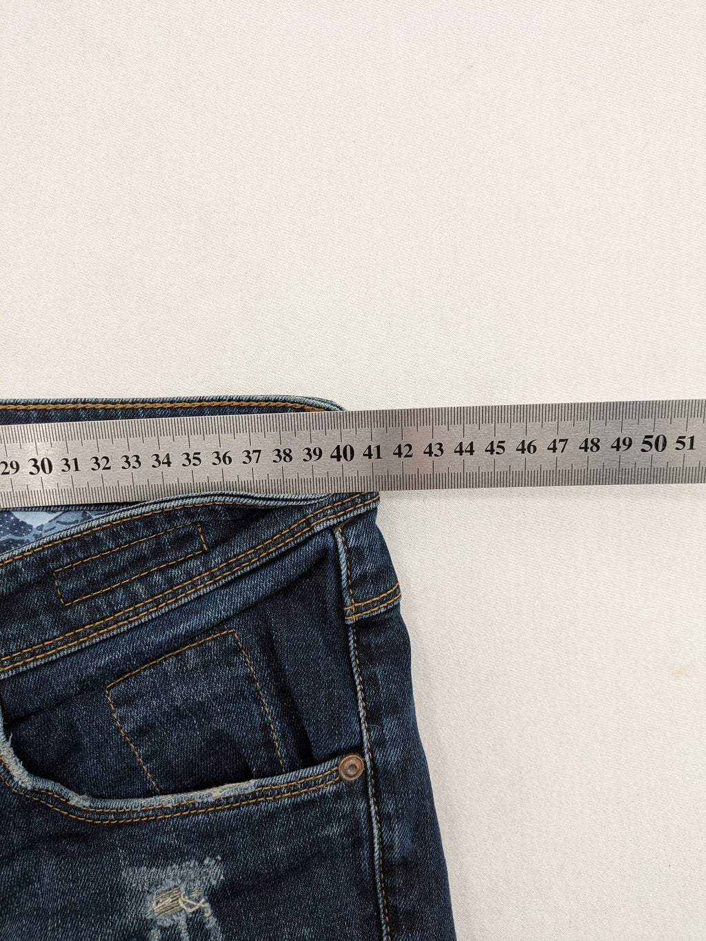 Lufian blue straight jeans dark wash distressed 5-pocket style with stretch denim.