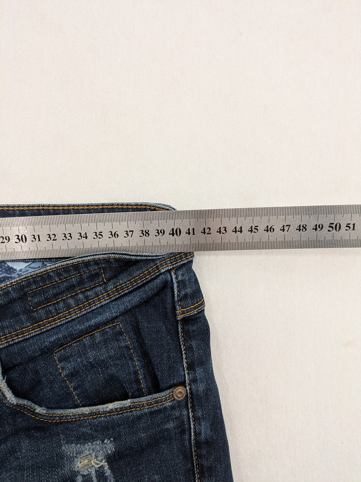Lufian blue straight jeans dark wash distressed 5-pocket style with stretch denim.