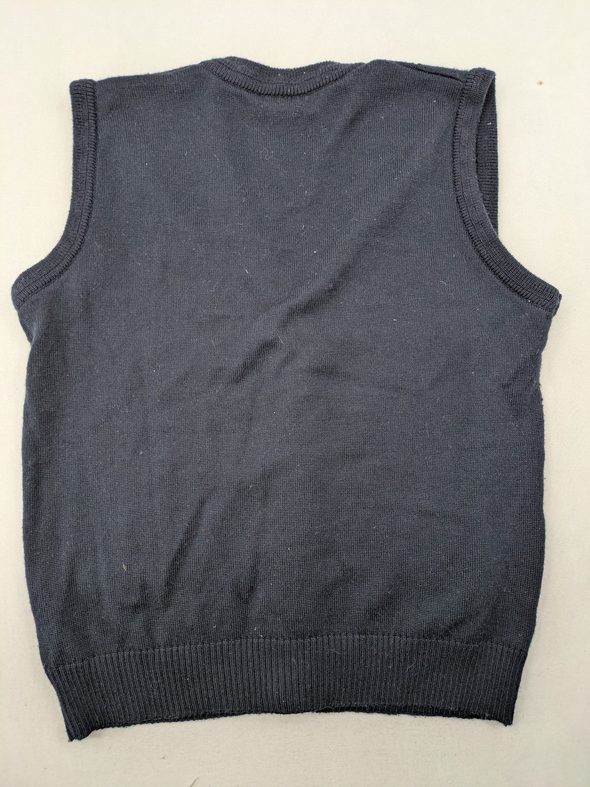 Via Cortesa gold turtle neck jumper with structured pattern and V-neck design.