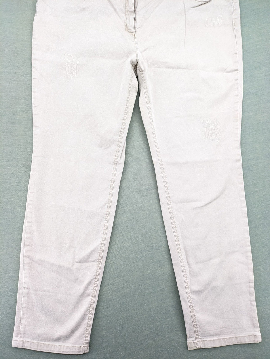 Canda beige straight jeans with strass details and classic five-pocket design.