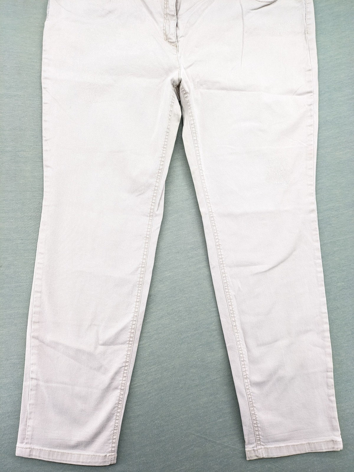 Canda beige straight jeans with strass details and classic five-pocket design.