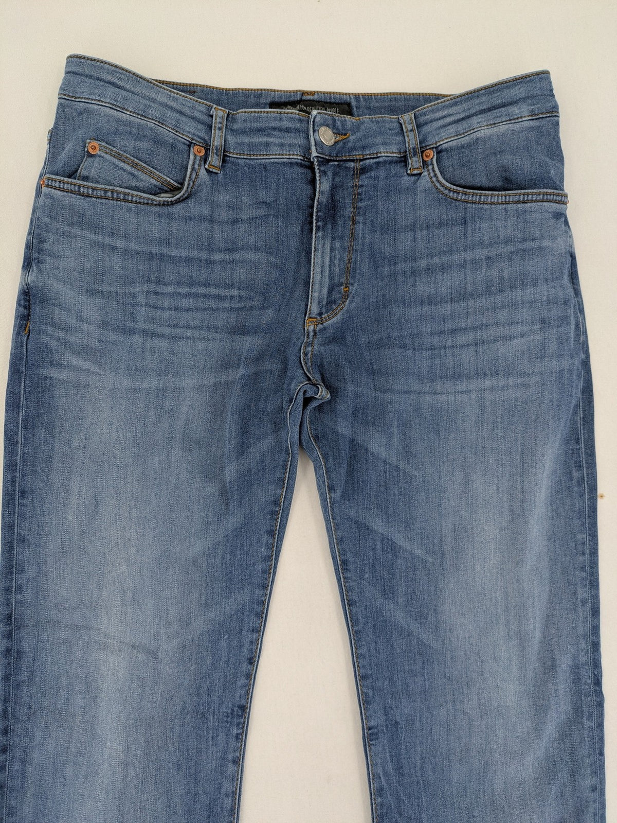 Drykorn blue straight jeans with stretch denim, classic fit, and logo patch on waistband.