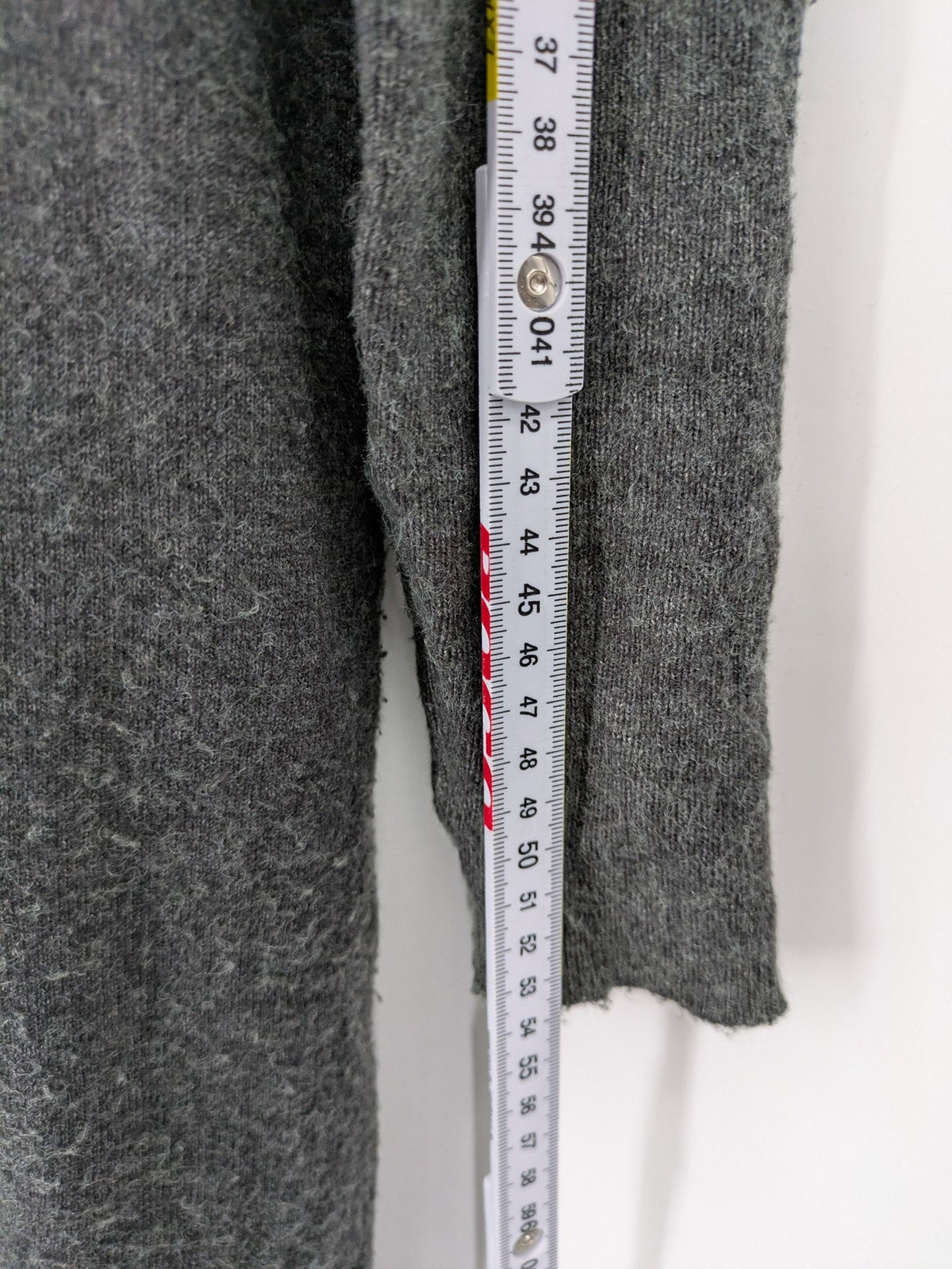ONLY grey knitted midi dress with roll neck, long sleeves, and side slits.