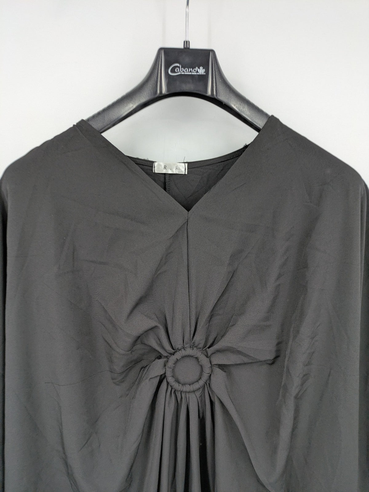 R.R grey kaftan dress with V-neck, oversized fit, and central ring detail.