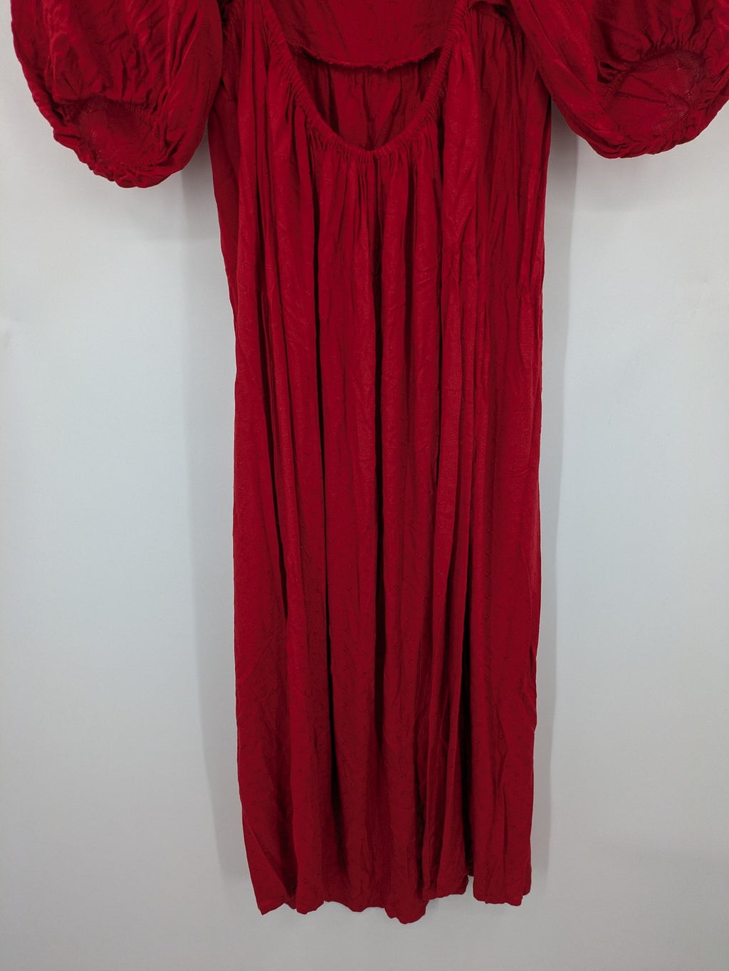 NEXT red midi dress with puff sleeves, smocked bodice, and stylish back cut-out.