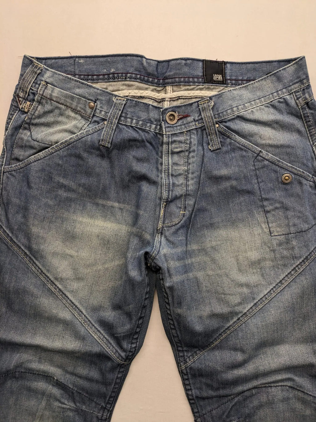 Jack & Jones blue straight jeans with biker panel details and button-fly closure.