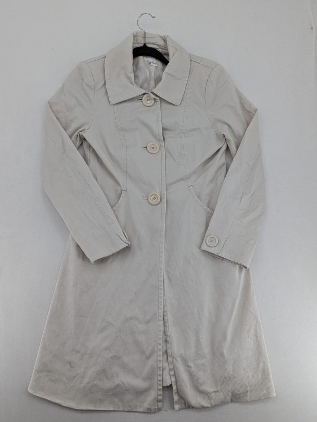 H&M beige trench coat size 38, classic design with button closure and striped lining.
