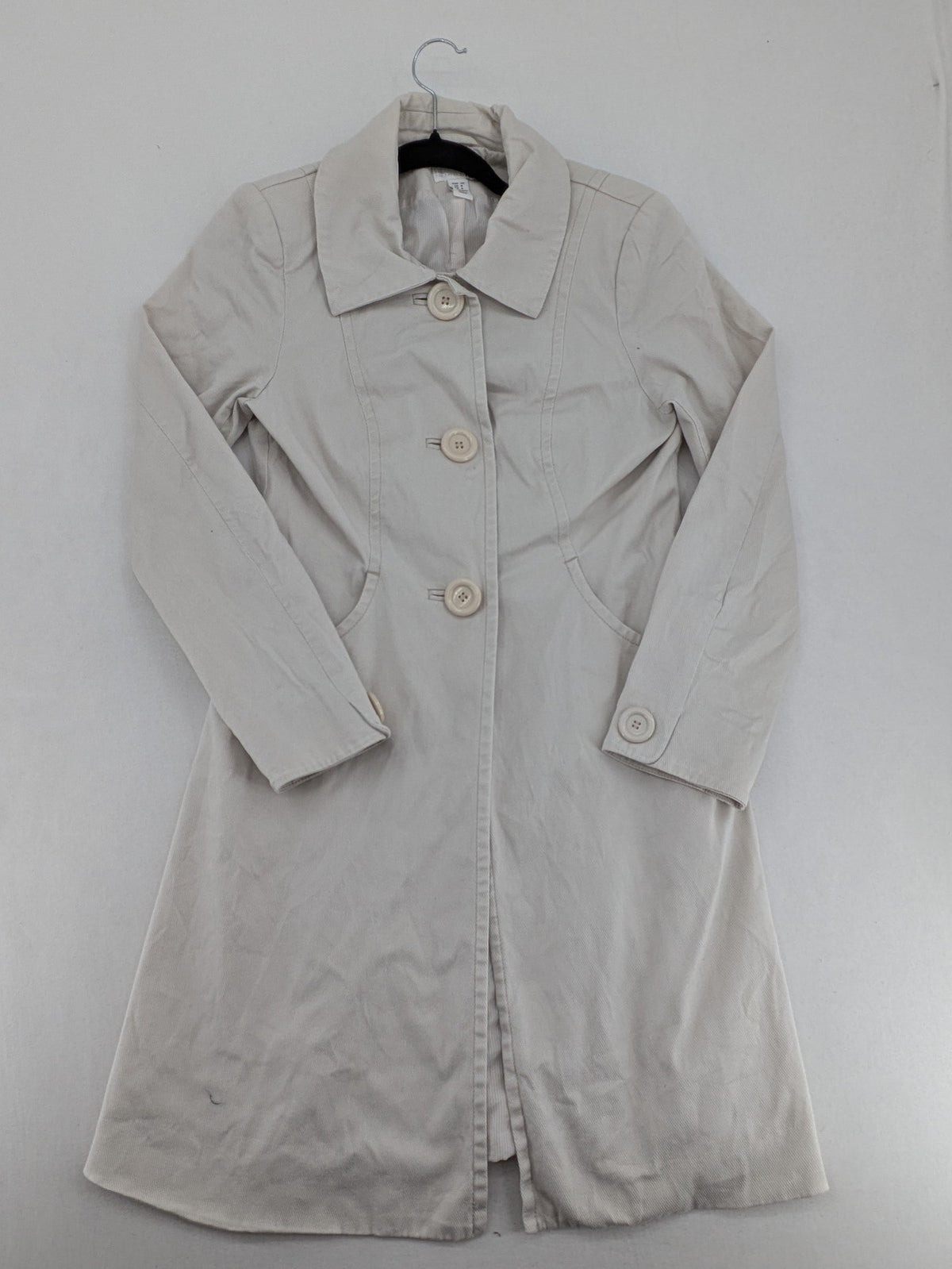 H&M beige trench coat size 38, classic design with button closure and striped lining.