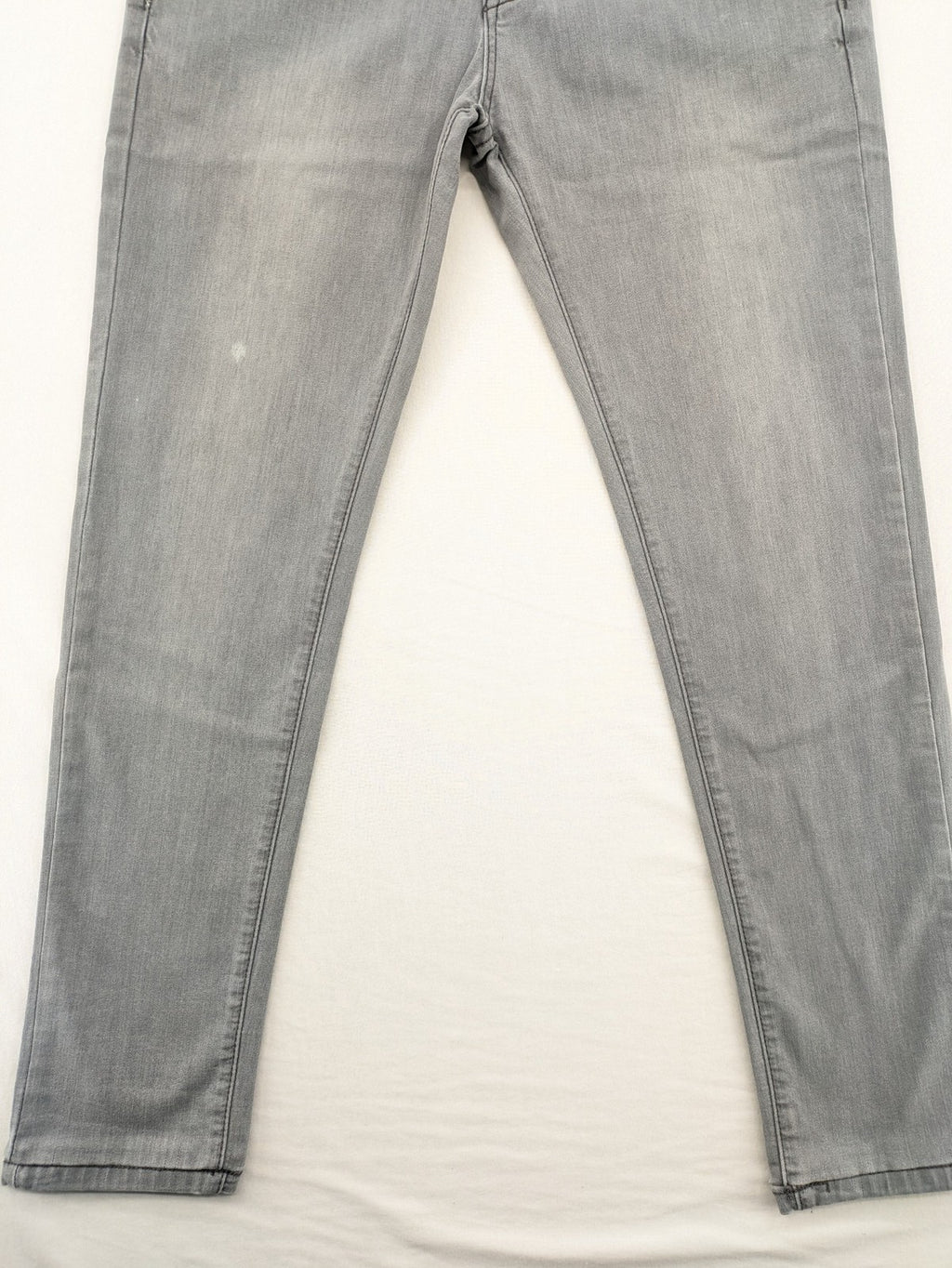 Born Rich grey slim fit jeans with logo patch and washed denim look.