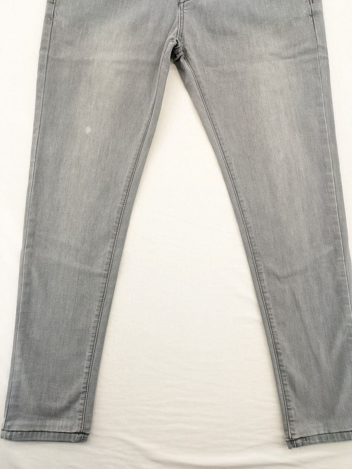 Born Rich grey slim fit jeans with logo patch and washed denim look.