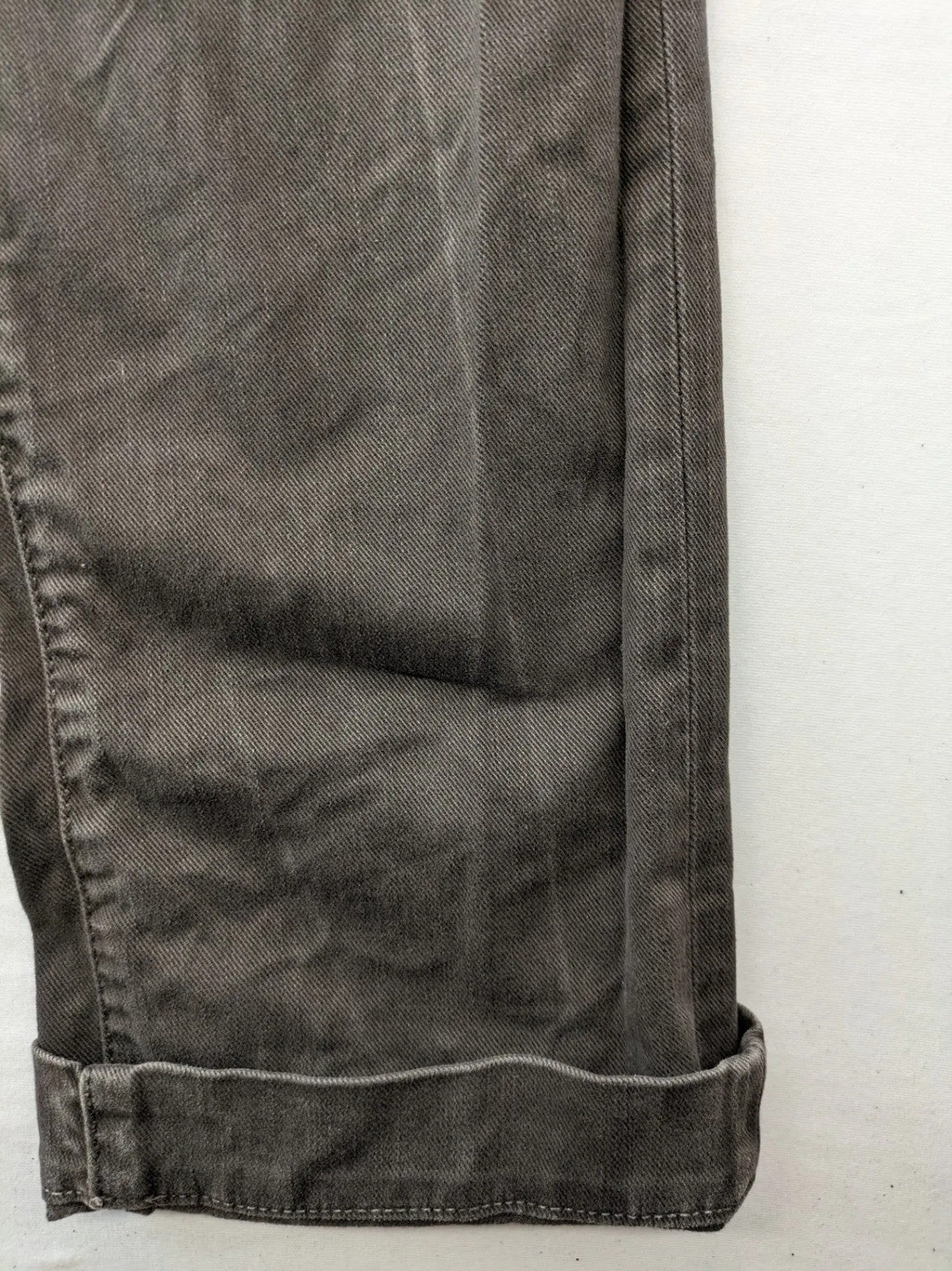 Jacob Cohen black straight jeans with leather logo patch and zip fly, size 32.