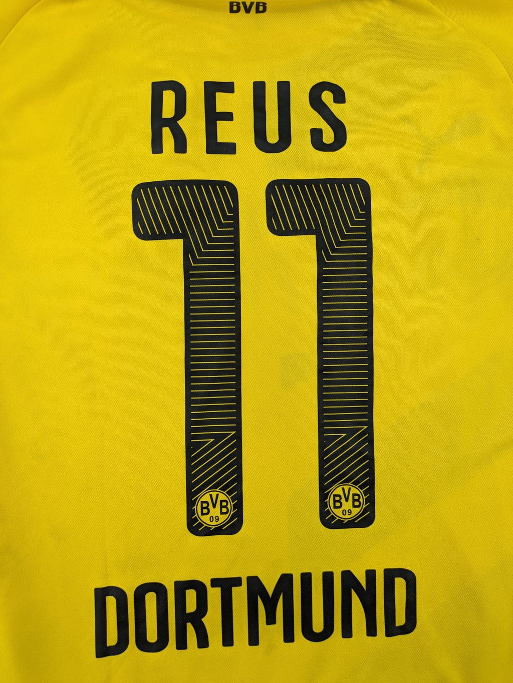 Puma black and purple soccer uniform with yellow accents, Reus #11, "Derbysieger 2015" print.