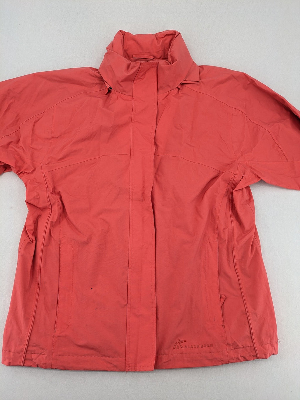 Black Bear black rain jacket with coral pink mesh lining and full zipper.