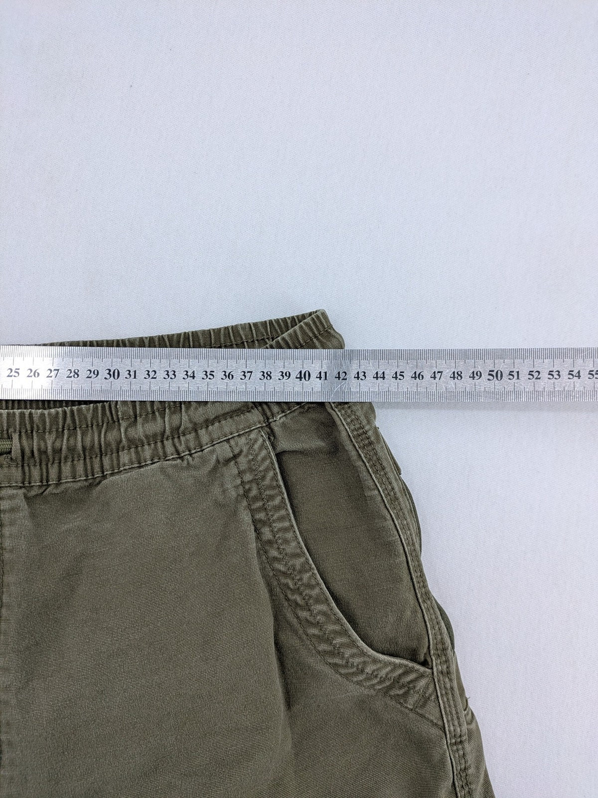 Denim & Co. khaki cargo jogger pants with elastic waistband and multiple pockets.
